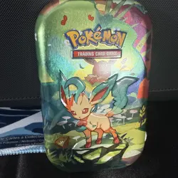Leafeon Prismatic Evolutions Mini Tin with Art Card and Coin Empty Tin - Image 1