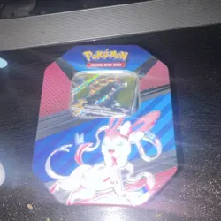 Pokemon Trading Card Game Mixed Card Lot with Tin, Holo, Sylveon, Tyranitar - Image 2