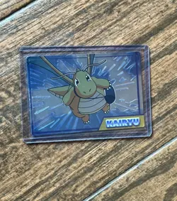 DRAGONITE (KAIRTU)--JAPANESE MEIJI EMBOSSED PROMO FOIL POKEMON CARD - Image 1