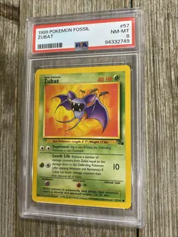 PSA 8 1999 POKEMON FOSSIL ZUBAT - Image 1