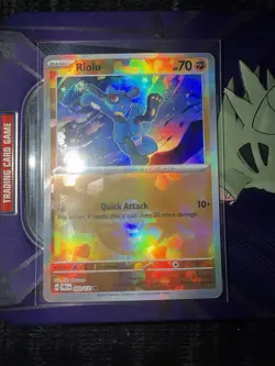 Pokemon Prismatic Evolutions TCG Riolu Pokeball Reverse Holo Card 050/131 - Image 1