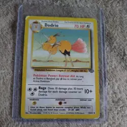 Dodrio 34/64 Jungle Expansion Pokemon Card 1999 comes in a Toploader sleeve - Image 1