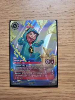 Lilo - Causing an Uproar (Enchanted) 217/204 Reign of Jafar Holo- Disney Lorcana - Image 1