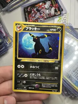 SWIRL 2001 Japanese Neo 2 Discovery Crossing the Ruins Umbreon 197 Holo Pokemon - Image 3