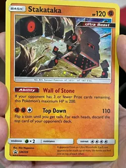 POKEMON STAKATAKA SM209 PROMO BLACK STAR COSMOS HOLOFOIL NM CARD - Image 1