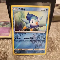 Pokemon Piplup Common SM - Cosmic Eclipse 54/236 NM Reverse Holo - Image 1