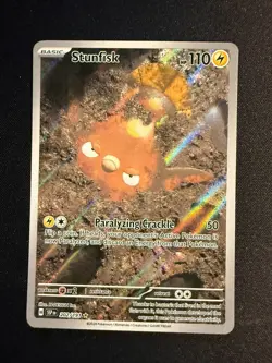 Pokemon Stunfisk 202/191 Sv08: Surging Sparks Holo PRISTINE - Image 1