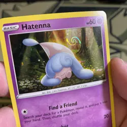 POKEMON HATENNA SWSH040 BLACK STAR PROMO COSMOS HOLOFOIL WITH HD SWIRL LP CARD - Image 1