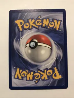 Team Rocket's Meowth Black Star Promo Pokemon Card #18 - Image 2