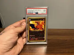 2000 Pokemon Japanese Neo 2 Charizard Reverse Foil Promo #006 PSA 9 - Image 1