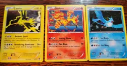 Pokemon Card Cosmo Holo Articuno 27/99,Zapdos 41/99,Moltres 14/99 Next Destinies - Image 1