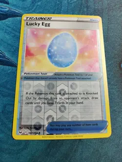 Lucky Egg | Reverse Holo | MINT | Sword & Shield 167/202 | Uncommon | Pokemon - Image 1