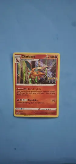Pokemon Charizard 010/078 GO Holo Rare 170 HP Flare Blitz Burn Brightly - Image 1