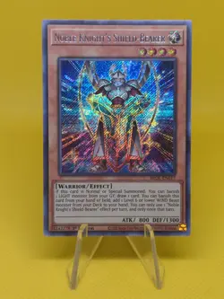 Yugioh - Noble Knight's Shield-Bearer (BROL-EN017) - Secret Rare 1st Edition - Image 1