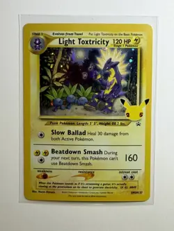 Pokemon TCG Light Toxtricity SWSH137 Celebrations Black Star Promo Holo - Image 1