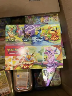 Prismatic Evolutions Mini Tin Display Sealed Pokemon TCG Scarlet and Violet - Image 1