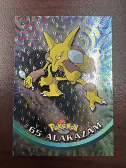 1999 Topps TV Series #65 Alakazam Flames Card Pokemon TCG Foil Black Label NM - Image 1