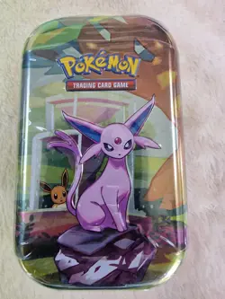 Pokemon Scarlet & Violet - Prismatic Evolutions Mini Tin - DENTED BUT SEALED - Image 1
