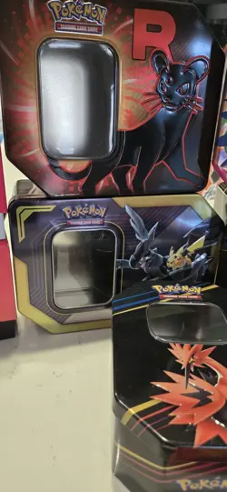 Pokemon Tin & ETB Lot Sleeves Charizard Zekrom Pikachu Team Rocket & More Empty - Image 4