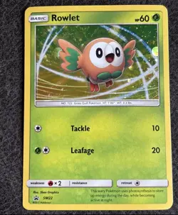 💥 Rowlet SM22 Sun & Moon Black Star Promo Cosmos Holo Pokemon Card - Image 1