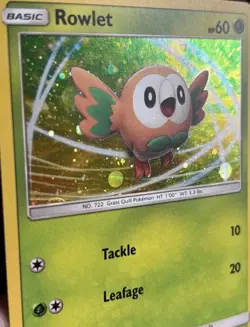 💥 Rowlet SM22 Sun & Moon Black Star Promo Cosmos Holo Pokemon Card - Image 2