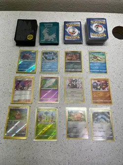 Mixed Lot of Holo foil Pokemon Cards, All foil & Duplicates w/ Card Sleeves - Image 1