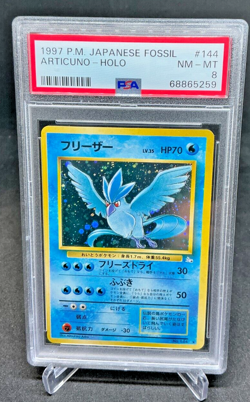 PSA 8 - 1997 Pokemon Japanese Fossil ARTICUNO-HOLO #144 (5259) - Image 1