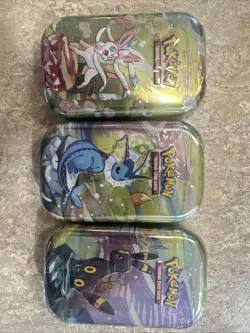 Pokemon Scarlet Violet Prismatic Evolution Mini Tin 3-Pack - Image 1