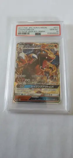 PSA 10 GEM MINT JAPANESE POKEMON 2017 CHARIZARD GX 011/051 BATTLE SM3H - Image 1