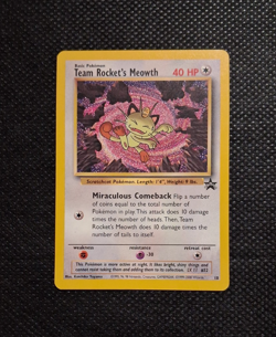 Team Rocket's Meowth 18 Black Star Promo Pokemon Card NM - Image 1