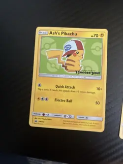 Pokemon TCG Ash's Pikachu Black Star Promo Card SM112 2017 I Choose You - Image 1