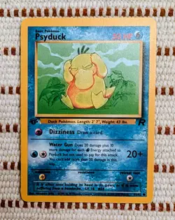Psyduck 65/82 1st Edition Team Rocket Pokemon Card LP/NM - Image 1