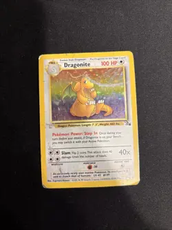 1999 Pokemon Fossil set Dragonite Holo Rare card, specifically card number 4/62. - Image 1