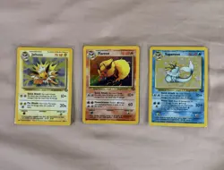 1999 Pokemon Flareon #3/64, Jolteon #4/64, Vaporeon #12/64 Jungle Holo Trio - Image 1