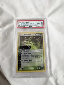 2004 Pokemon EX Team Magma Vs. Team Aqua 1 Team Aqua’s Cacturne Holo PSA 10 - Image 1