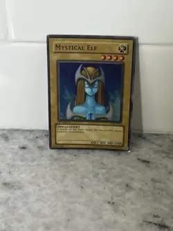 Yugioh Mystical Elf 062 Glossy Super Rare 1st Edition - Image 1