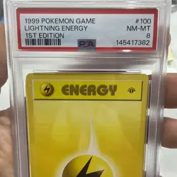 1999 Pokemon Game 1st Edition Shadowless 100 Lightning Energy, PSA 8 - Image 2