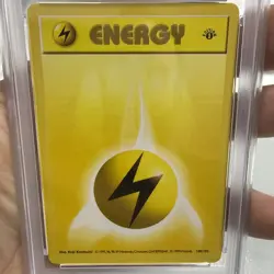 1999 Pokemon Game 1st Edition Shadowless 100 Lightning Energy, PSA 8 - Image 3