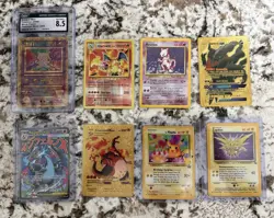 Pokemon Card Lot Ancient Mew CGC 8.5, Charizard, Mewtwo, Pikachu Birthday - Image 1