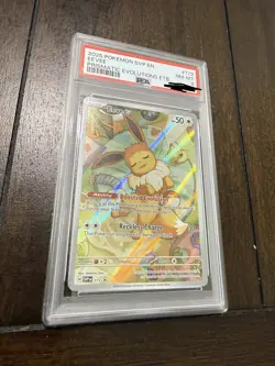 2025 POKEMON SVP EN-SV PRISMATIC EVOLUTIONS ETB PROMO #173 EEVEE PSA 8 - Image 1