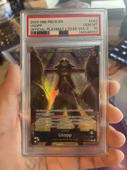 2025 ONE PIECE PROMOS OFFICIAL PLAYMAT LIMITED EDITION VOL.3 #042 USOPP PSA 10 - Image 1