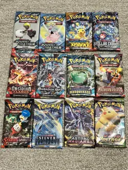 Lot Of 12 Unopened Pokemon Booster Packs - Image 1