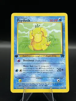 (NM) Psyduck 1st ed 65/82 Team Rocket Pokemon TCG Card 330a-122 - Image 1