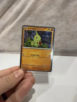 Pokemon Paldea Evolved Larvitar Cosmos Holo Common 110/193 NM - Image 1