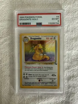 1999 POKEMON FOSSIL #4 DRAGONITE-HOLO PSA 6 - Image 1