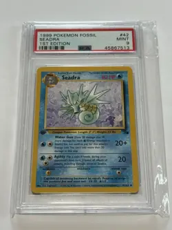 1999 Pokemon 1st Edition Fossil Seadra #42 Card TCG WOTC Mint PSA 9 Still Sealed - Image 1