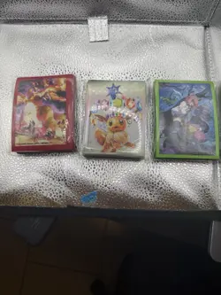 Nintendo Charizard & Eevee Multicolor Card Sleeves for Pokemon TCG Players - Image 1