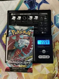 22.64g Extremely HEAVY - Pokemon TCG S&V Paradox Rift Booster Pack Sealed - Image 1