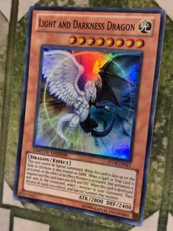 YuGiOh LIGHT AND DARKNESS DRAGON Super Rare Limited Edition STOR-ENSE1 - Image 1