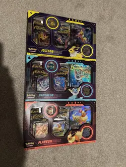 Nintendo Pokemon TCG Eevee Evolution Vmax Premium Collection Card Game Set of 3 820650851308 - Image 1
